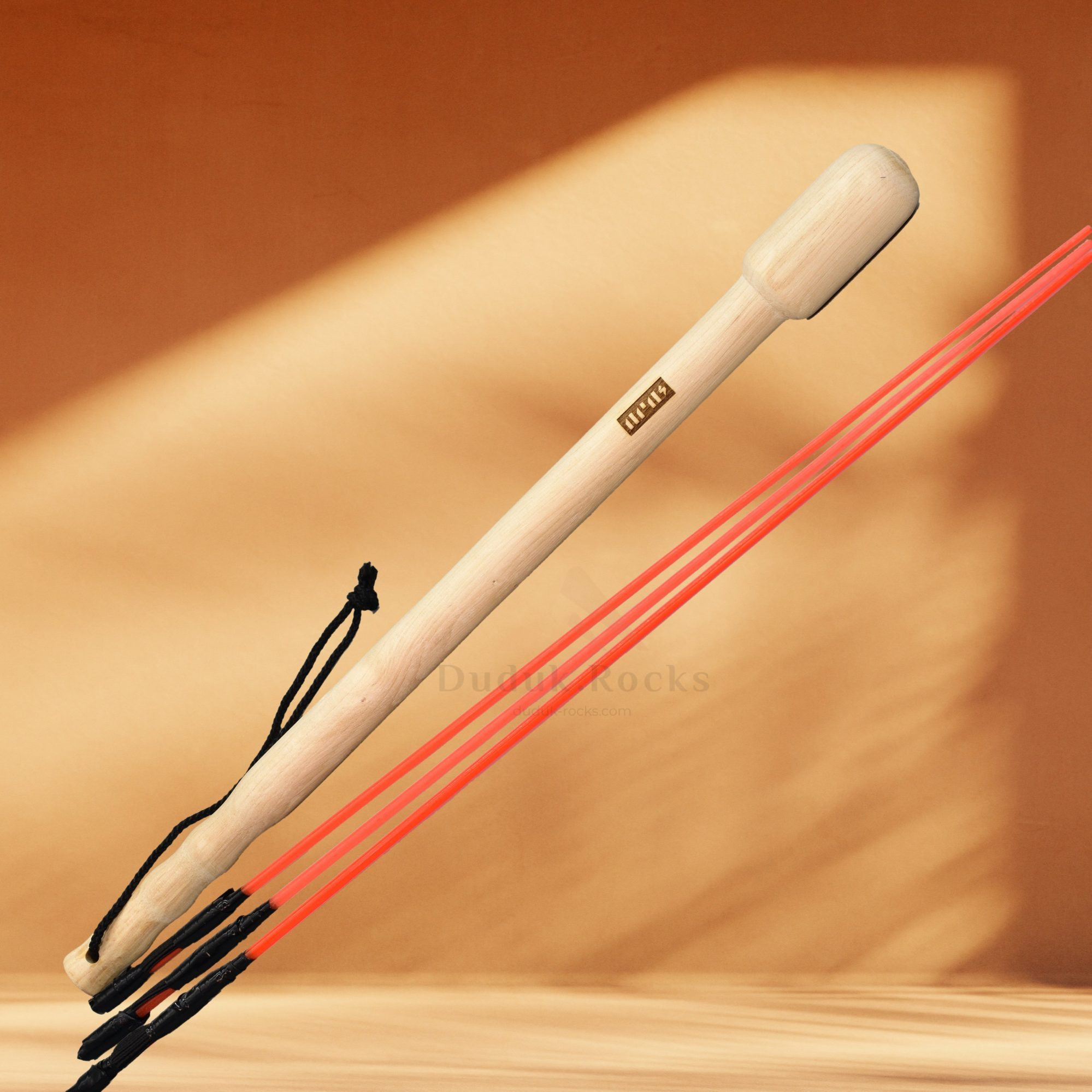 Vorot Bass Kopal-Dhol wooden hammer and three fiber sticks.